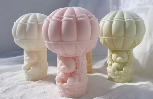 Teddybear in balloon candles